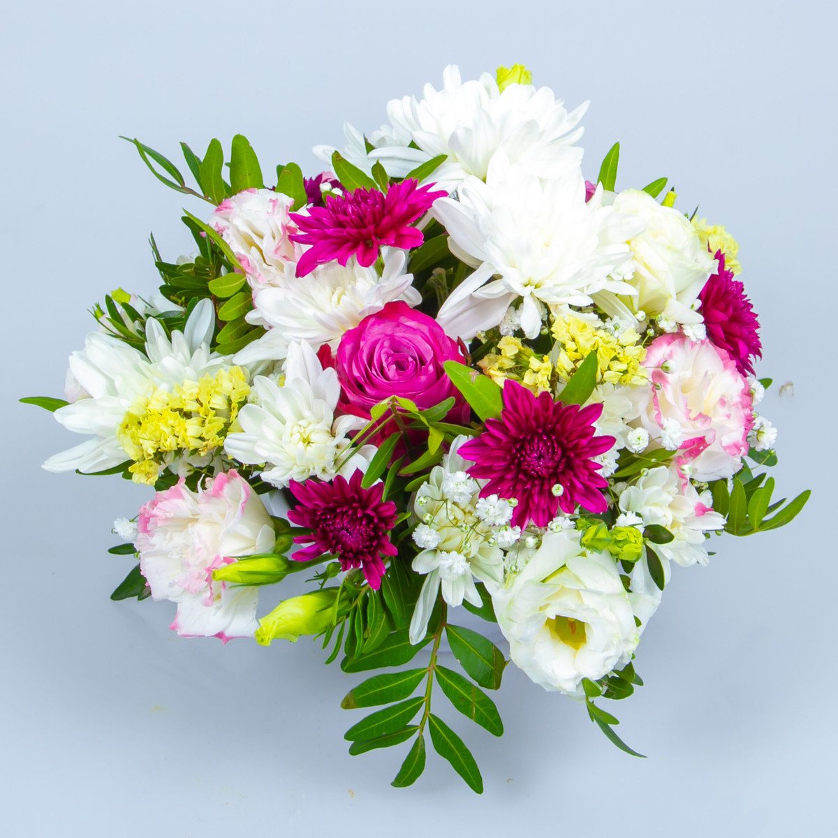 Round Composition Of Mums And Roses Table Arrangement