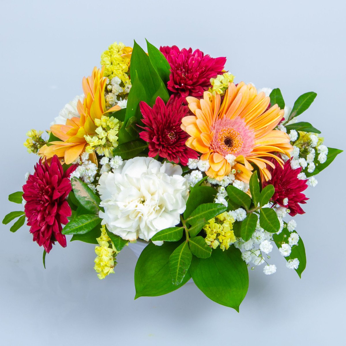 Round Composition Of Gerbera Mini, Mums And Carnations Table Arrangement