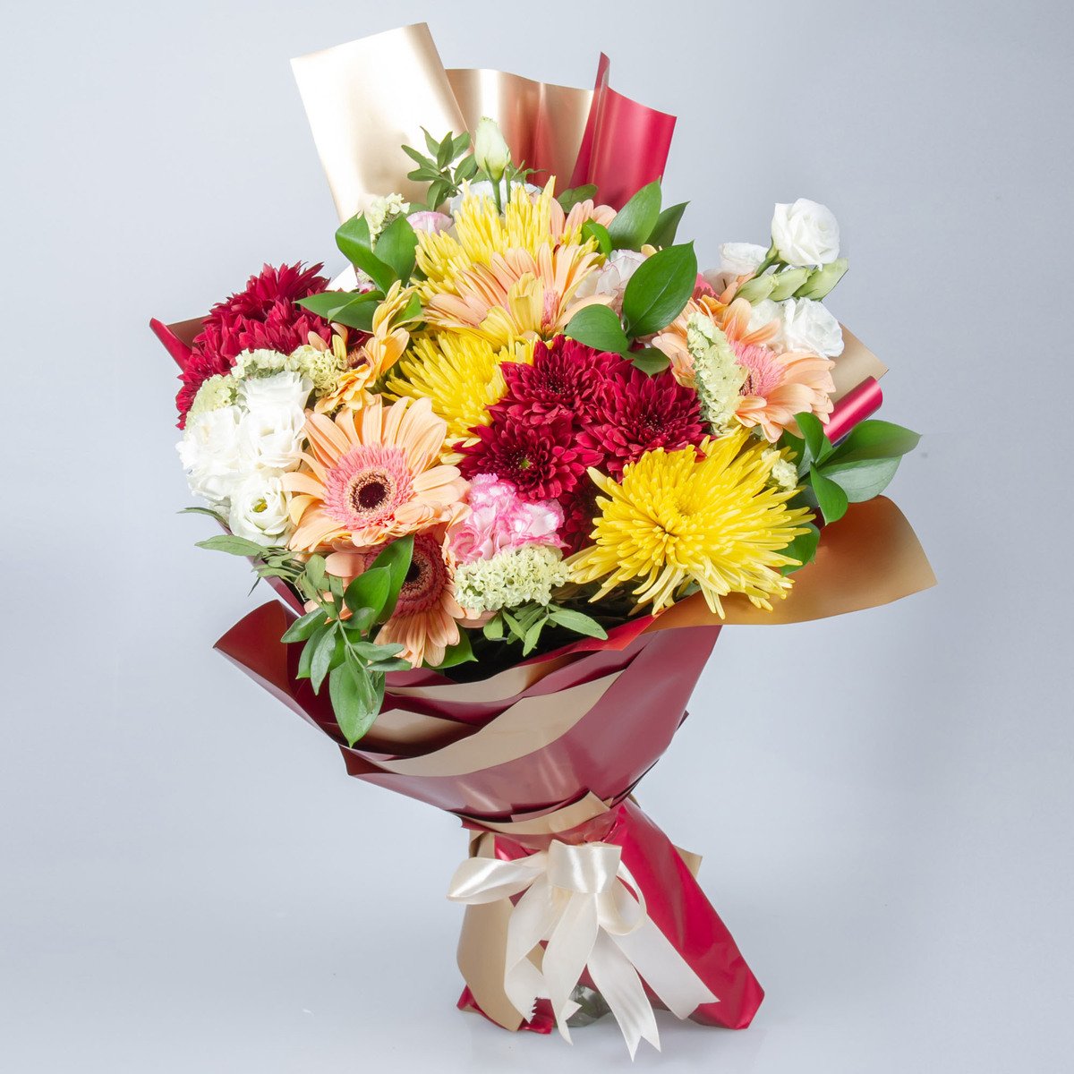 Mixed Flowers Hand Bouquet Of Germini, Delistar, Mums And Estomain Premium Packing