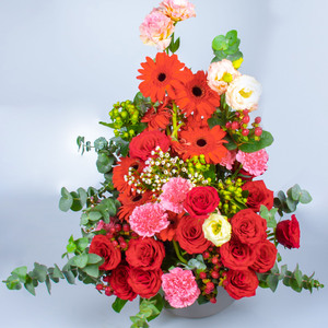 Facing Table Arrangement Roses, Carnations, Eustoma And Gemini