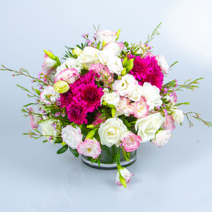 Round Glass Vase Arrangement With Mums, Eustoma, Roses, And Wax Flowers